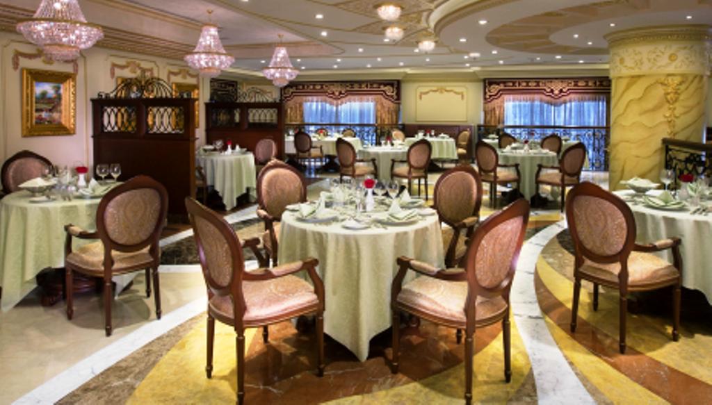 Royal Rose Abu Dhabi, A Curio Collection By Hilton Affiliated Hotel Exterior photo The interior of the restaurant
