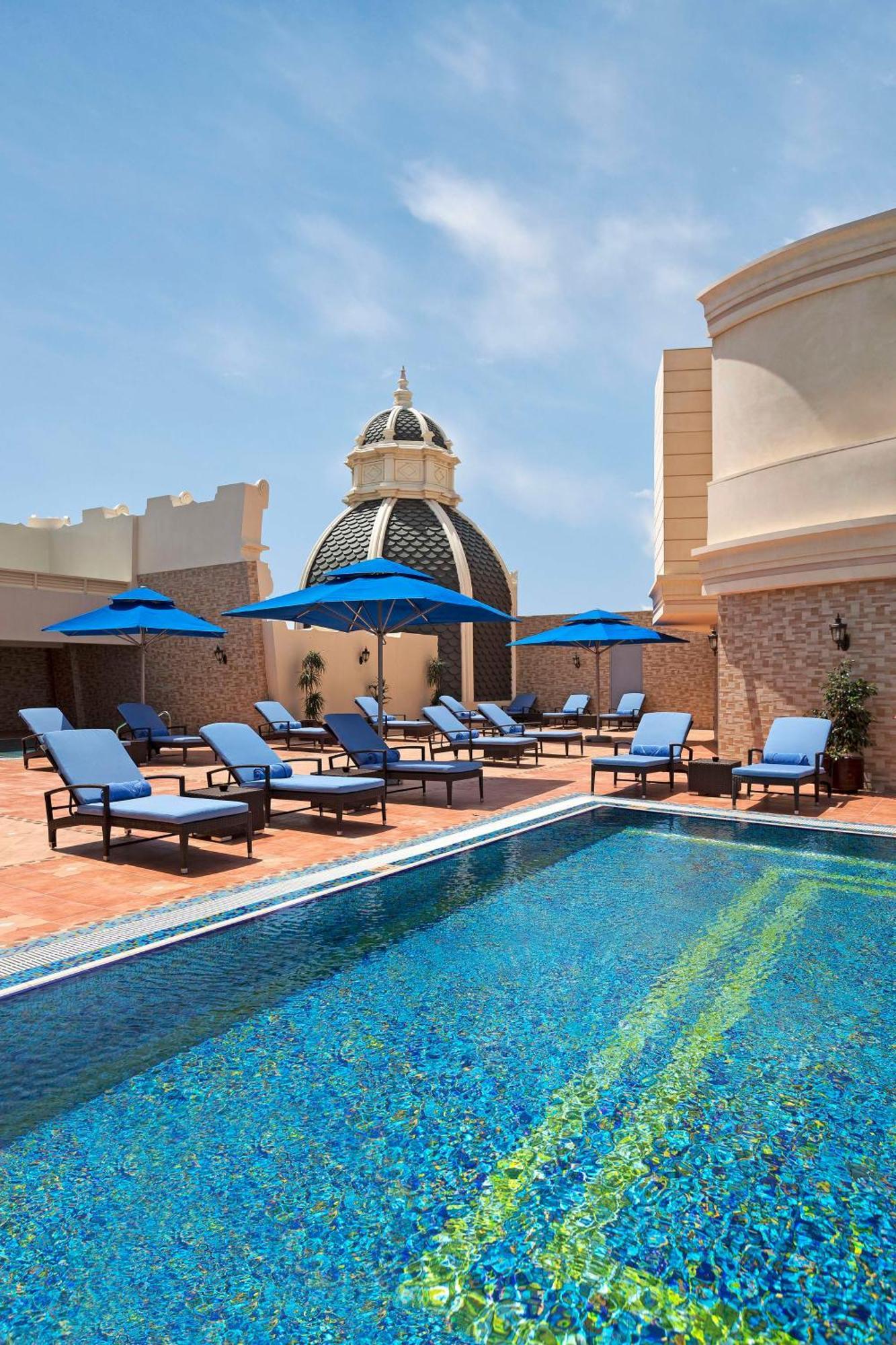 Royal Rose Abu Dhabi, A Curio Collection By Hilton Affiliated Hotel Exterior photo The pool at the Westin Palace, Riyadh